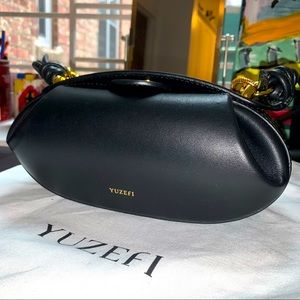 Yuzefi Dinner Roll leather shoulder bag black